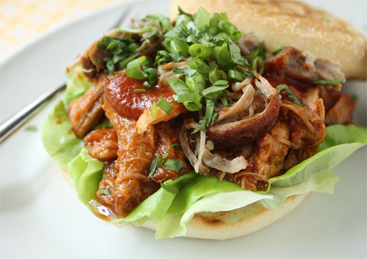 A pulled pork sandwich made with Poor Girl Gourmet's Braised Pork Shoulder.