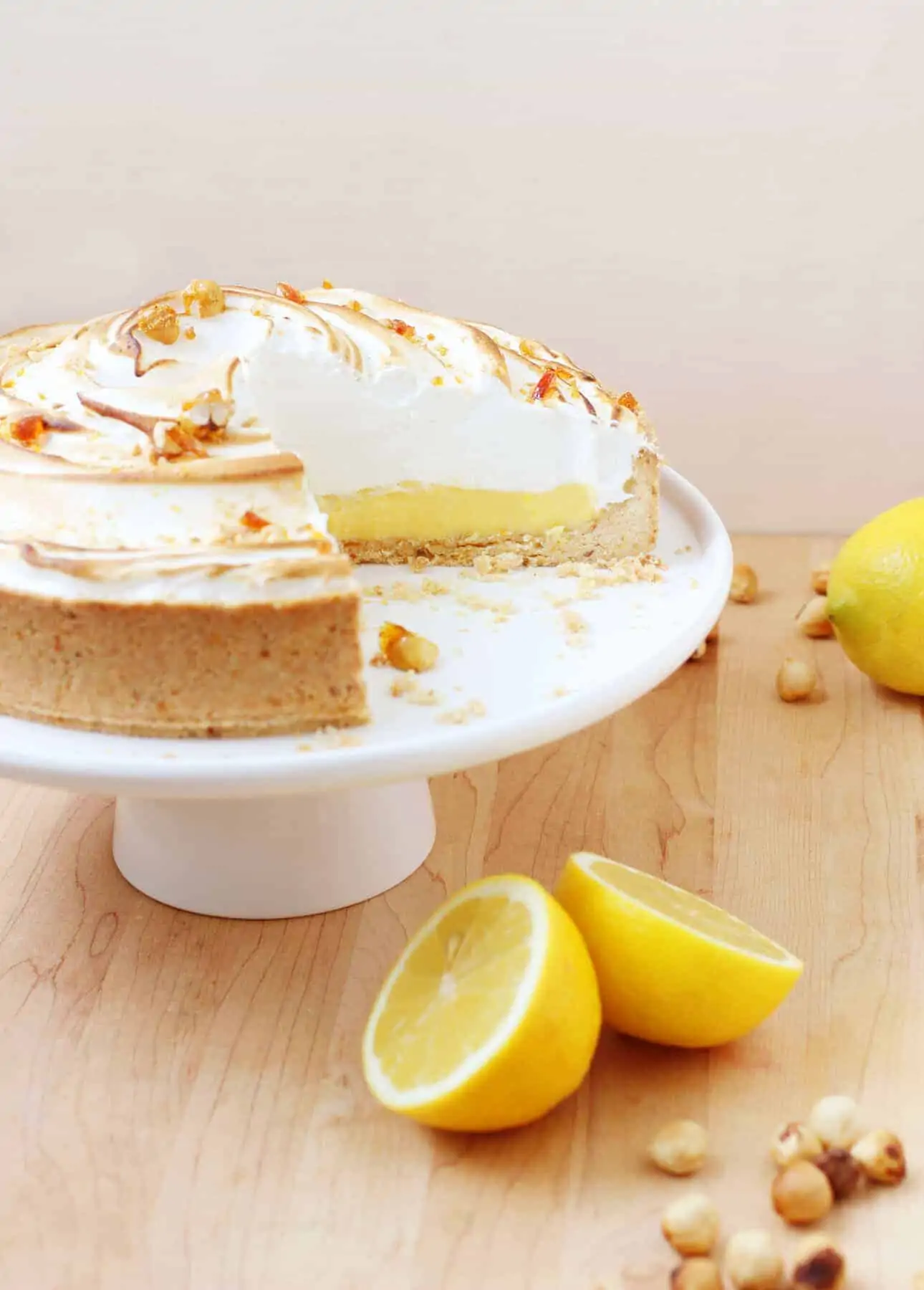 How to Make a Perfect Lemon Meringue Pie: This Lemon Meringue Pie recipe will create a truly memorable dessert: the easy, cookie-like hazelnut crust combined with the zesty filling and creamy Italian meringue will delight all fans of this classic dessert. Helpful tips and how-to video included! // FoodNouveau.com