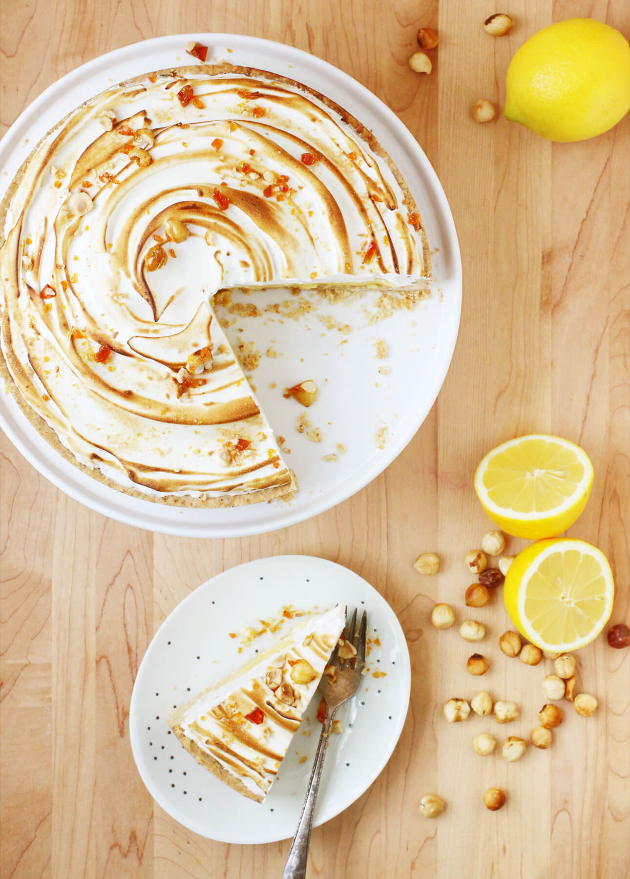 How to Make a Perfect Lemon Meringue Pie: This Lemon Meringue Pie recipe will create a truly memorable dessert: the easy, cookie-like hazelnut crust combined with the zesty filling and creamy Italian meringue will delight all fans of this classic dessert. Helpful tips and how-to video included! // FoodNouveau.com