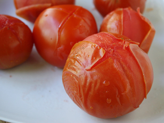 Tomatoes, after 10-15 seconds in boiling water: ready to undress! // FoodNouveau.com