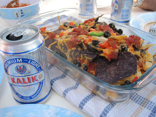Nachos go well with a refreshing Kalik, the beer of the Bahamas!