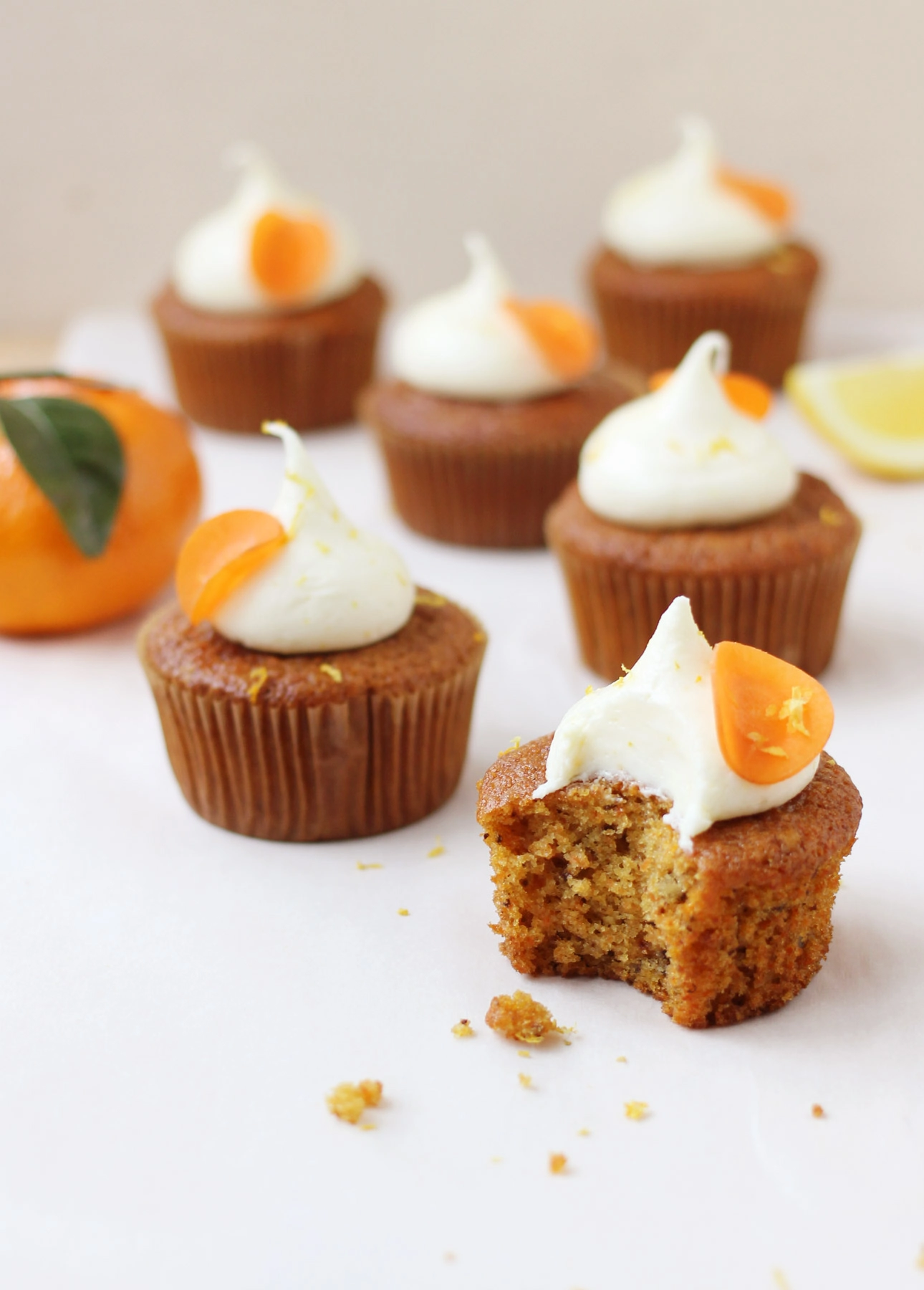 Orange and Carrot Cupcakes with Zesty Cream Cheese Frosting, one of 35 Irresistible Orange Dessert Recipes on FoodNouveau.com