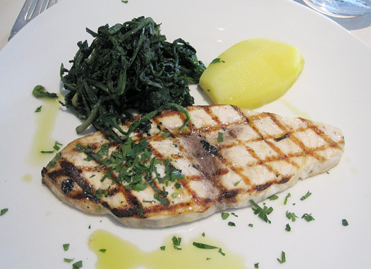 Pesce spada  - grilled swordfish with wilted greens and super-flavorful olive oil
