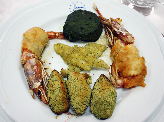 Giant prawns, white fish fillets, mussels and a spinach and ricotta flan
