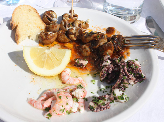 A light lunch: Sea snails, octopus and fresher than fresh shrimp. With lots of lemon, of course.
