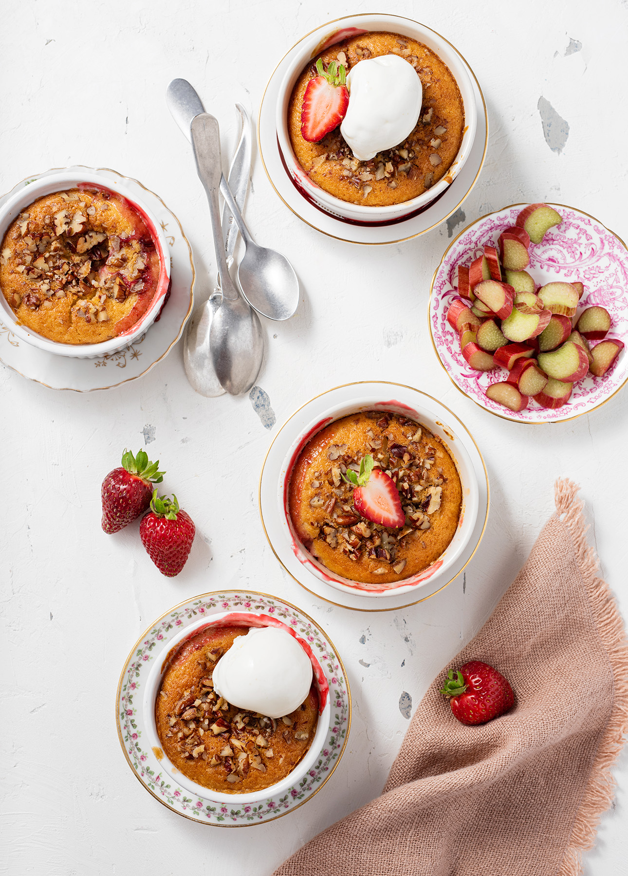 Strawberry Rhubarb Pudding Cakes // FoodNouveau.com