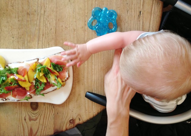 Comfortably installed in a portable high chair at Le Pain Quotidien, in Paris // FoodNouveau.com