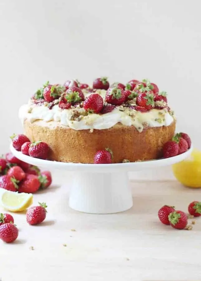 Homemade Angel Food Cake with Lemon Curd, Maple-Roasted Strawberries, and Pistachio Crumbs {+ How To Video} // FoodNouveau.com