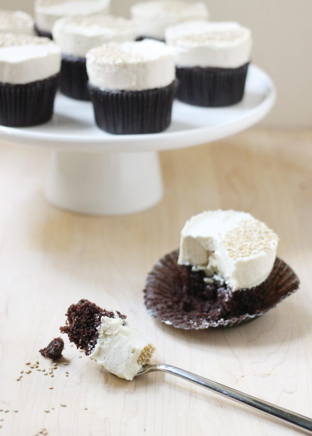 Cupcake fatigue? This recipe is your remedy. The tahini buttercream is slightly nutty and perfectly fluffy: a perfect match to the dark chocolate cupcakes! // Dark Chocolate Cupcakes with Tahini Buttercream // FoodNouveau.com