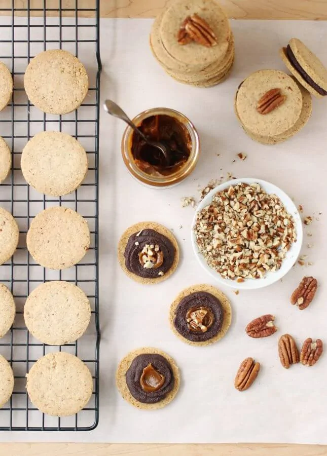 Pecan Shortbread Cookies with a Dark Chocolate and Caramel Filling // FoodNouveau.com