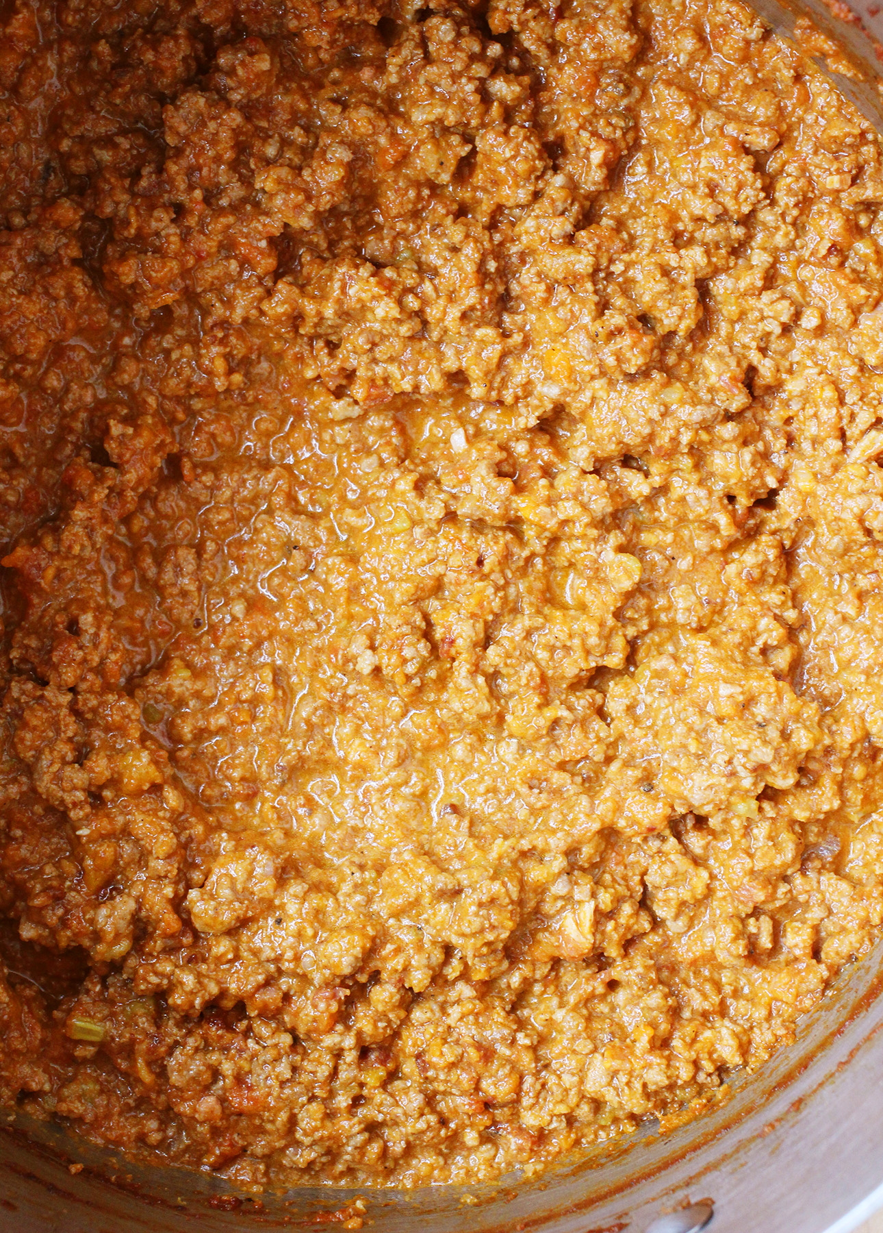 Thick, rich, and creamy freshly made Italian Bolognese Sauce // FoodNouveau.com