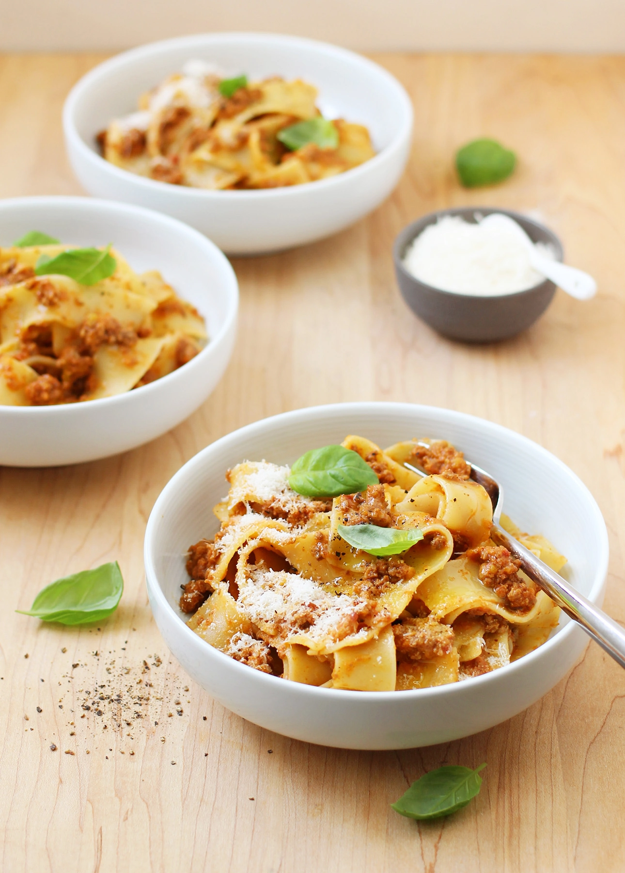 Serving bowls of Pappardelle al Ragu Bolognese, a long, wide pasta served with Italian Bolognese Sauce // FoodNouveau.com