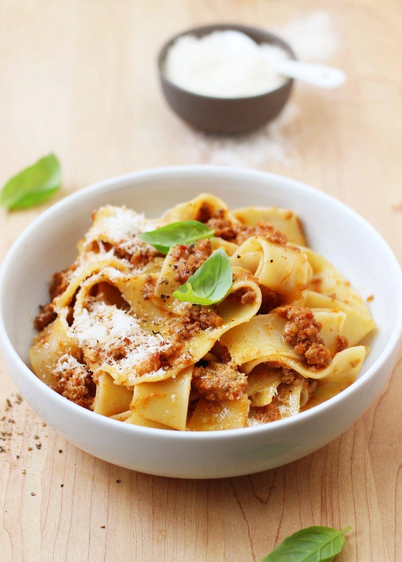 A serving bowl of Pappardelle al Ragu Bolognese, a long, wide pasta served with Italian Bolognese Sauce // FoodNouveau.com