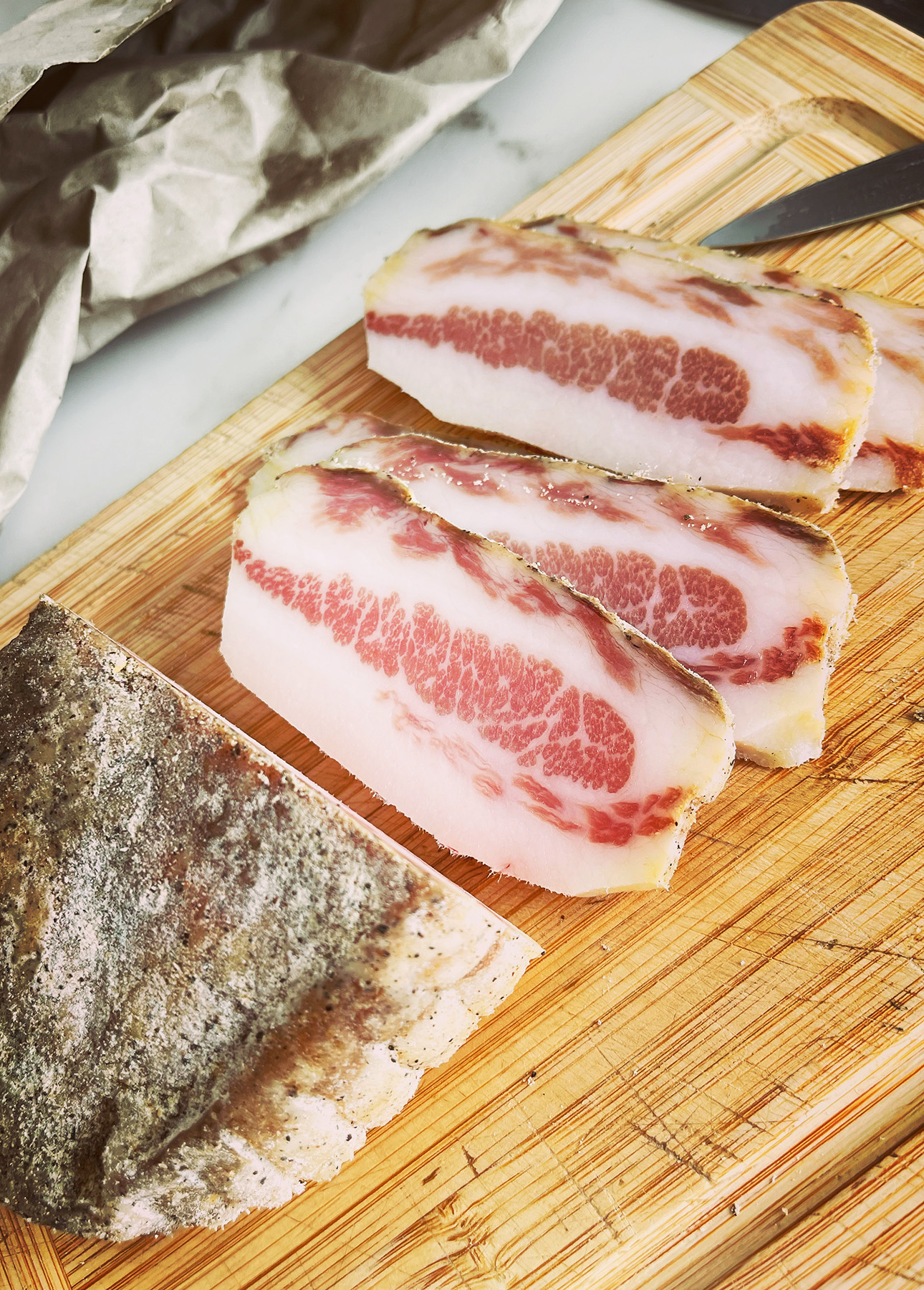 Guanciale is a cured pork product used to make Bucatini All'Amatriciana // FoodNouveau.com