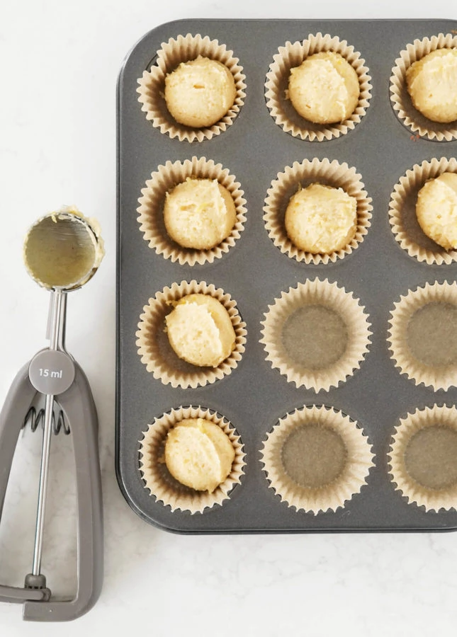 How to portion financier batter quickly and easily: with a cookie scoop! // FoodNouveau.com