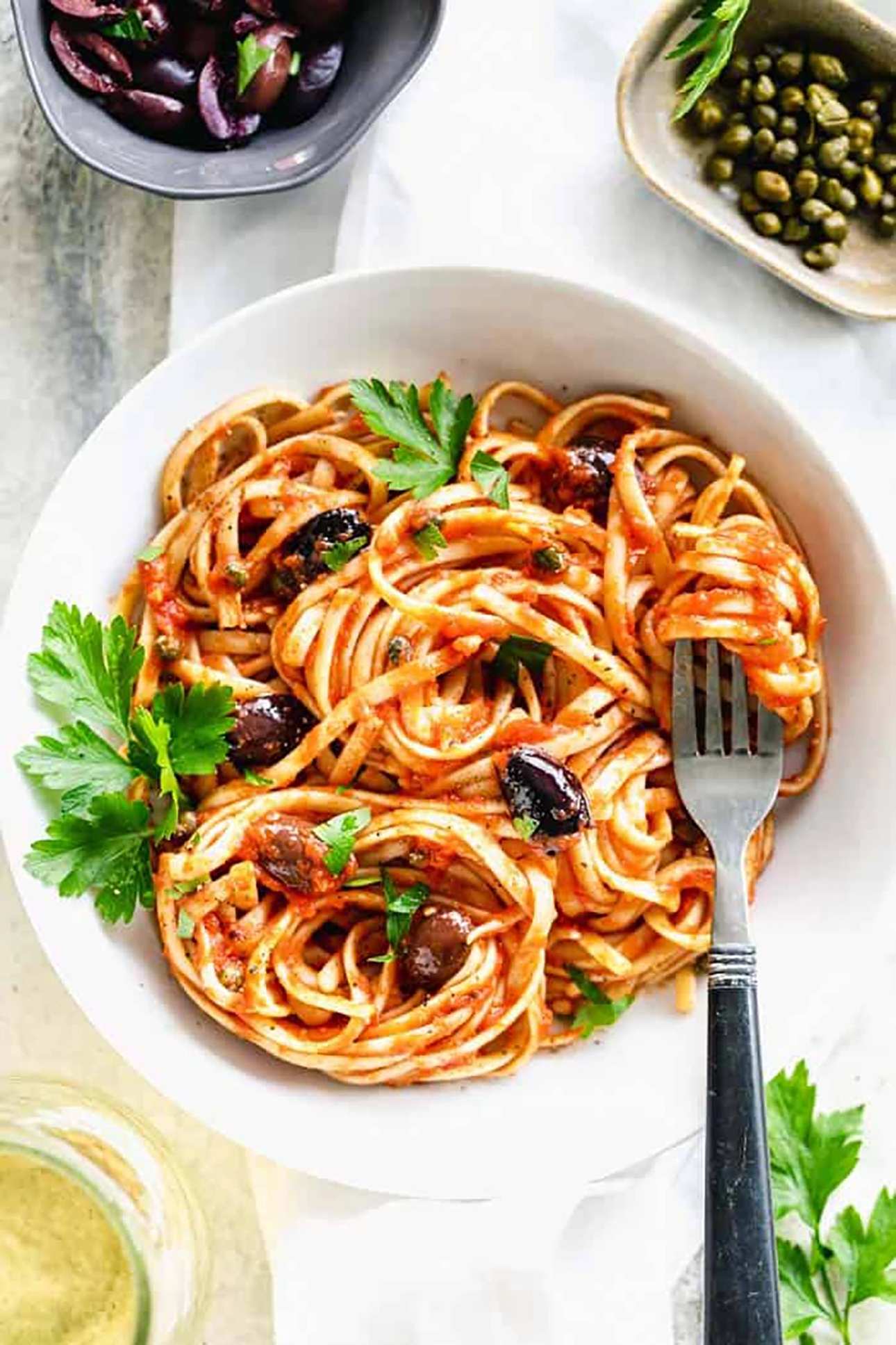 Spaghetti alla Puttanesca by Healthy Seasonal Recipes // 21 Easy Authentic Italian Pasta Dishes for Weeknight Dinners