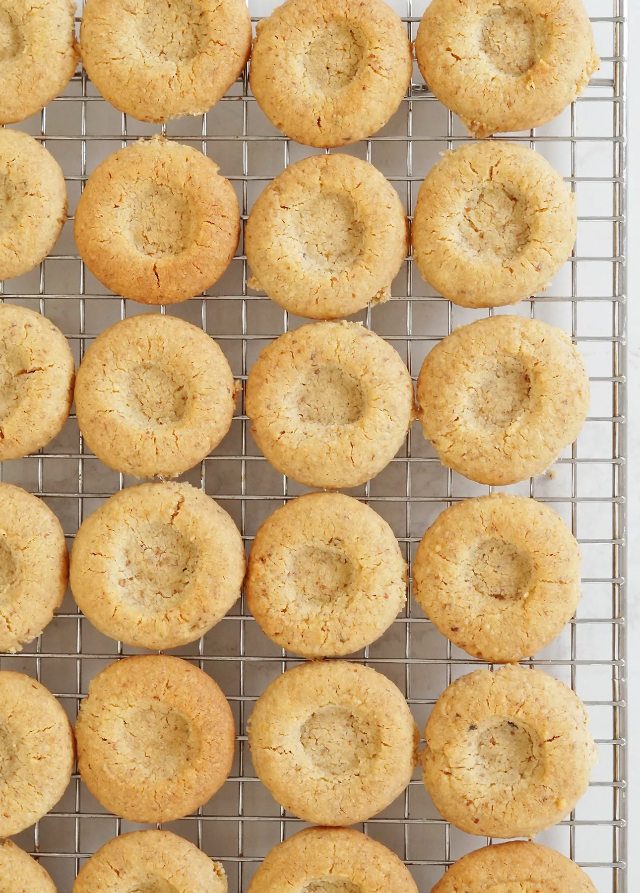 Baked maple thumbprint cookies, ready to be garnished with maple butter // foodnouveau.com