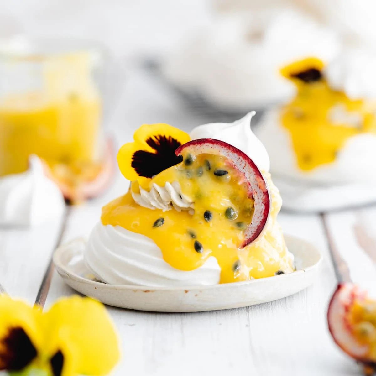 Vegan Meringue Nests with Lemon Passion Fruit Curd by Addicted to Dates // FoodNouveau.com