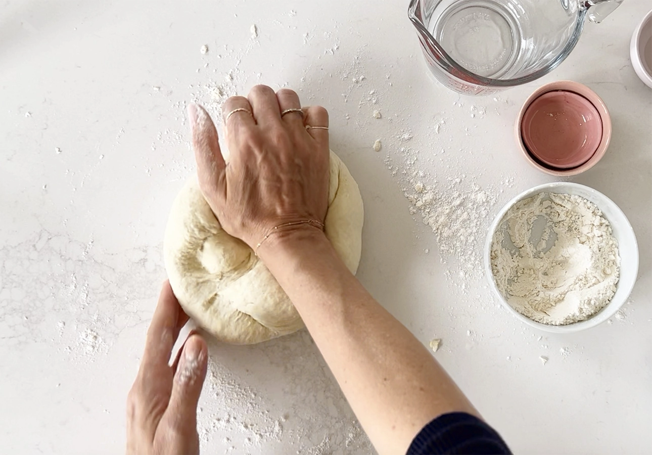 Kneading dough to make Pissaladière, a flatbread from the South of France // FoodNouveau.com