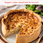 A classic quiche Lorraine with a golden, crispy crust and creamy, cheesy filling sits on a plate with a slice cut out. Text banners read: “Classic French Recipe: Quiche Lorraine” and “Elegant, make-ahead dish for brunch!”. // FoodNouveau.com