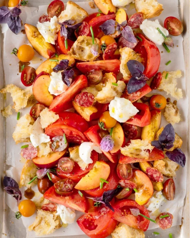 Tomato peach panzanella is my dream summer salad: ripe tomatoes, juicy peaches, toasted bread, herbs, and just enough dressing to brighten things up 🍅🍑 It’s colorful, generous, and exactly what I want to eat when the farmers' market is doing half the work for me 😇
.
The bread matters in a panzanella. Use something sturdy, toast it well, and let it soak up the tomato juices and dressing for a few minutes before serving. You want texture, not crouton gravel, and definitely not wet bread 👎🏼
.
Click the link in my profile to get my recipe for Tomato Peach Panzanella Salad, or comment RECIPE and I’ll DM it to you right away 🧡
.
https://foodnouveau.com/tomato-peach-panzanella-salad/
.
#panzanella #tomatosalad #peachrecipes #summersalad #italianrecipes