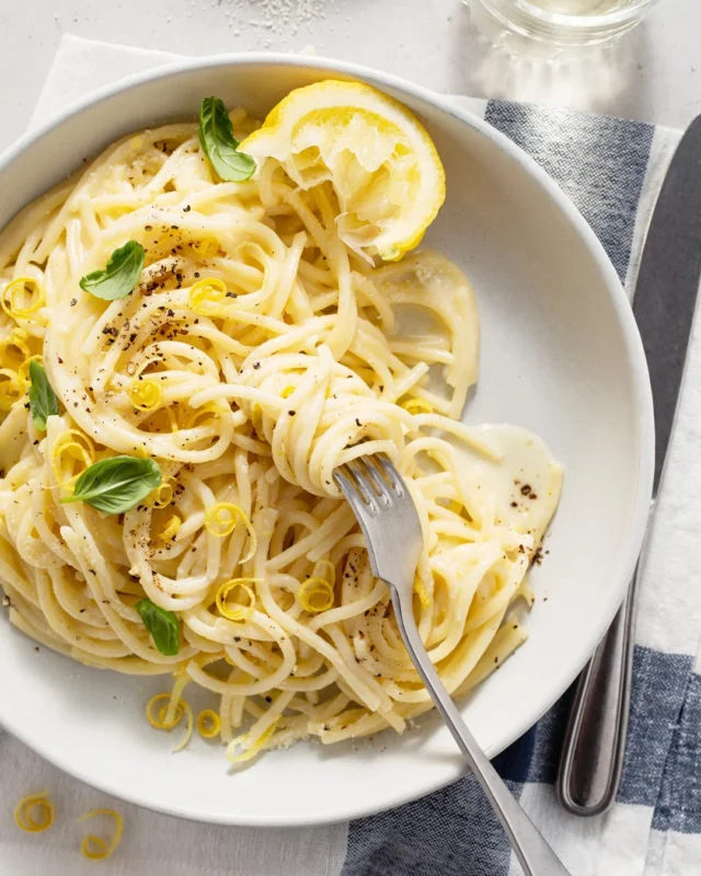 Five ingredients, one glossy lemon sauce, and no cream in sight 🍋 😇Spaghetti al Limone is one of my fastest pasta dinners: Parmigiano, lemon zest and juice, and pasta water turn a pot of spaghetti into something bright, creamy, and completely irresistible.
.
The important part happens in the pan: finish cooking the pasta with the sauce so the starch and cheese emulsify instead of simply sitting on the noodles. I often wilt in baby spinach, then add in cooked chicken or shrimp to turn the basic recipe into a fuller dinner.
.
Click the link in my profile to get my recipe for Spaghetti al Limone, or comment RECIPE and I’ll DM it to you right away 🍋
.
https://foodnouveau.com/spaghetti-al-limone/
.
#spaghettiallimone #lemonpasta #pastarecipe #italianfood #weeknightdinner

Spaghetti al Limone Recipe: https://foodnouveau.com/spaghetti-al-limone/