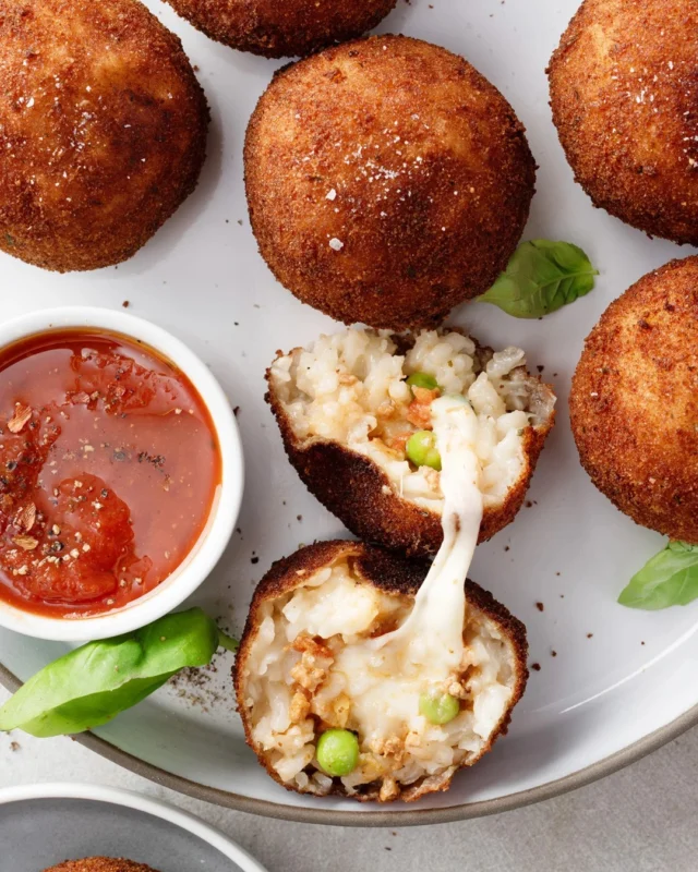 Cold leftover risotto is never a problem: it's tomorrow’s arancini 🤩 These Sicilian rice balls wrap creamy risotto around ragù and mozzarella, then get a breadcrumb coat and a trip into hot oil for that crisp-shell, molten-center contrast 🌋
.
My post is a full step-by-step, because shaping and breading a batch is much easier once you can see what each stage should look like. Make them for aperitivo, a party, or simply because you deliberately cooked too much risotto and deserve a reward for such excellent planning 🏆
.
Click the link in my profile to get my recipe for Arancini (Sicilian Risotto Balls), or comment RECIPE and I’ll DM it to you right away! 🧀
.
https://foodnouveau.com/how-to-make-arancini/
.
#arancini #sicilianfood #italianrecipes #risottoballs #aperitivo